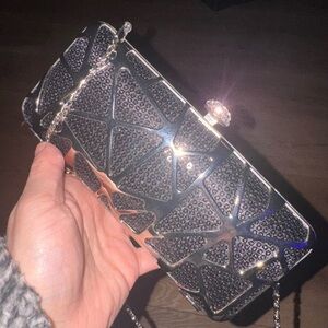 Black evening clutch bag.